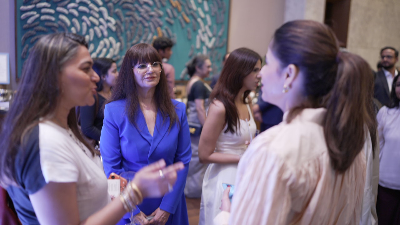 Guests in conversation during the networking reception at the report launch
