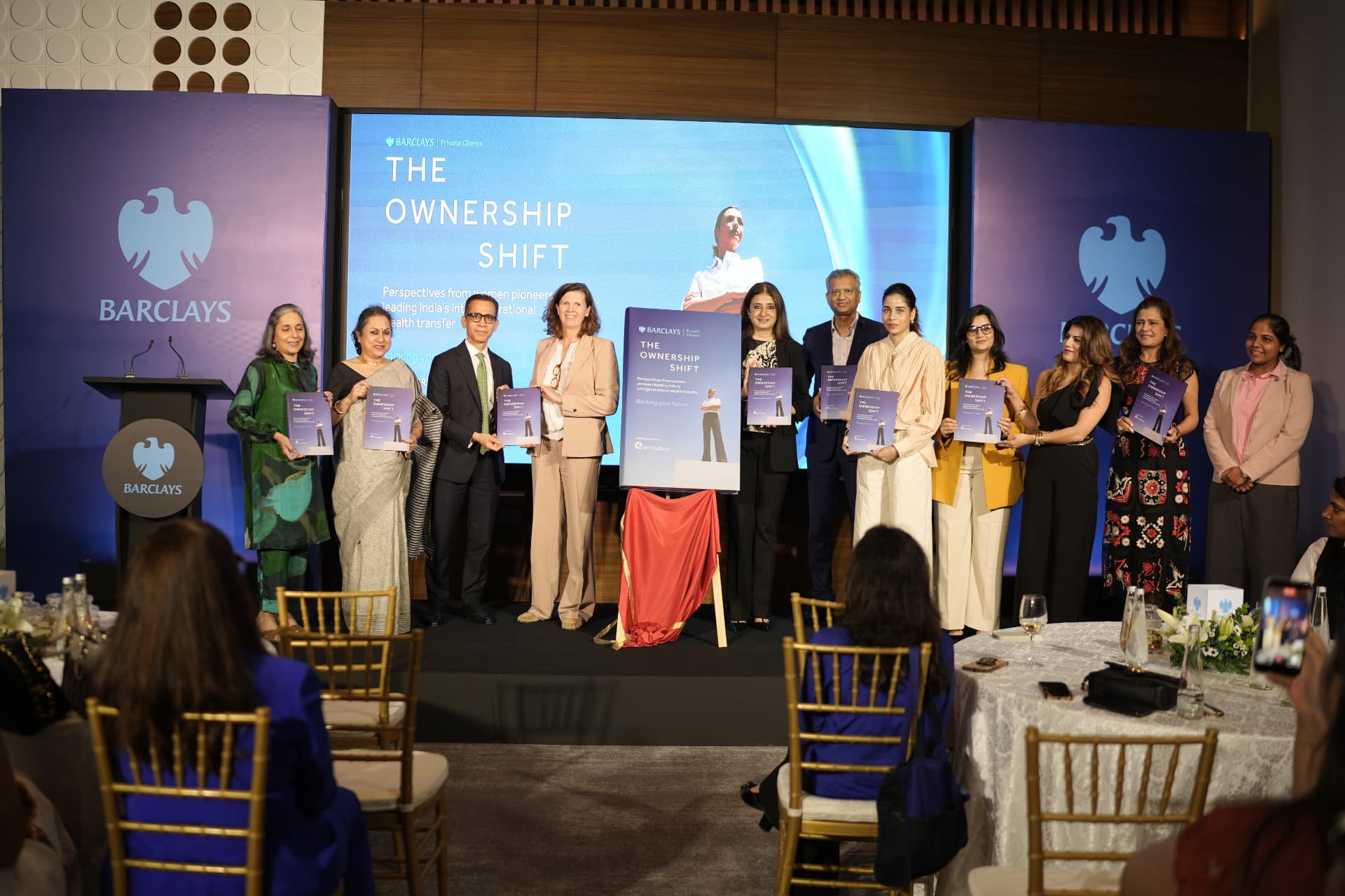 Unveiling of The Ownership Shift report on stage at the launch event